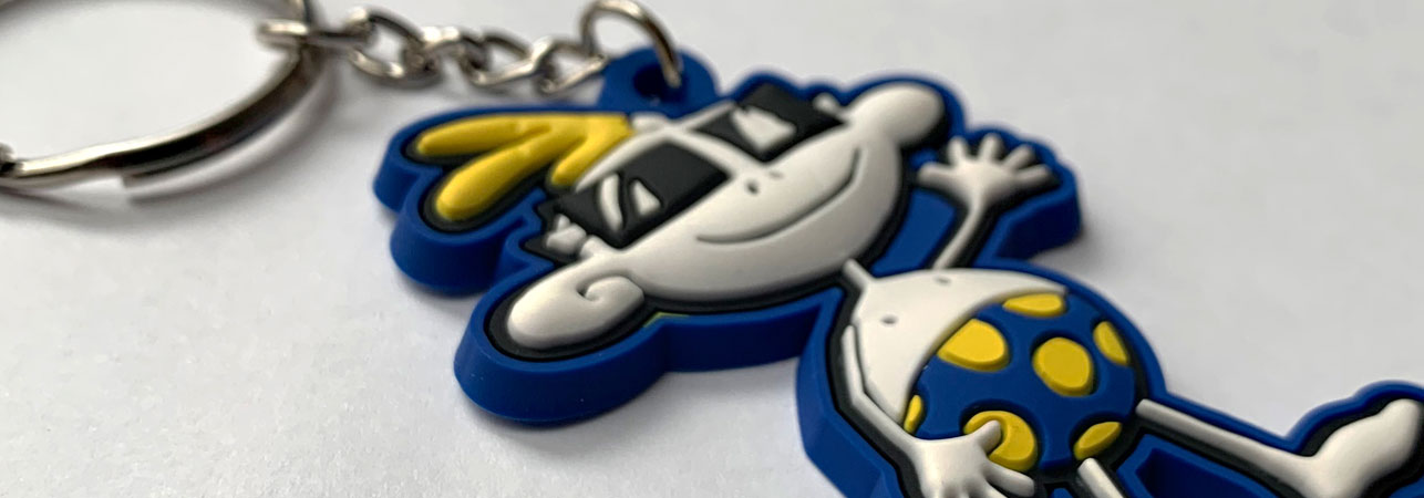 Soft rubberized PVC key chain, half-3D